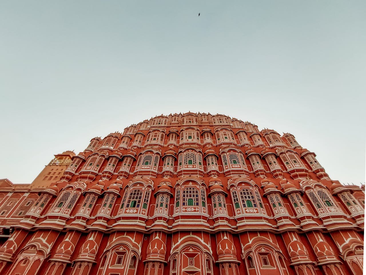 gallery-2 Low angle view of iconic Hawa Mahal facade in Jaipur, India. Captivating architectural marvel.