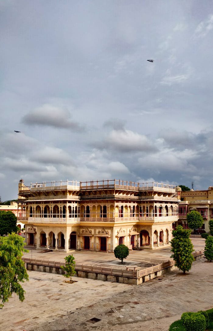 services-04 Explore the intricate architecture of a historical observatory in Jaipur, India under dramatic skies.